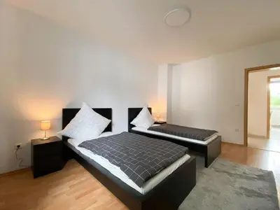 Ein Bett oder Betten in einem Zimmer der Unterkunft City Appartement