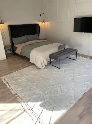 Ein Bett oder Betten in einem Zimmer der Unterkunft Buer City Apartment mit Balkon