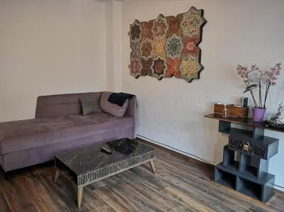 Ein Sitzbereich in der Unterkunft POLAT Apartments 3