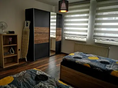 Ein Bett oder Betten in einem Zimmer der Unterkunft POLAT Apartments 3