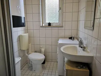 Ein Badezimmer in der Unterkunft POLAT Apartments 3