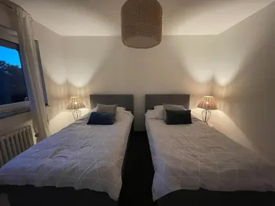 Ein Bett oder Betten in einem Zimmer der Unterkunft Ideale Unterkunft in Düsseldorf-Nord