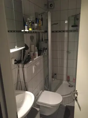 Ein Badezimmer in der Unterkunft Whg 21 Ferienhaus mit Garten und Terrasse 130 qm
