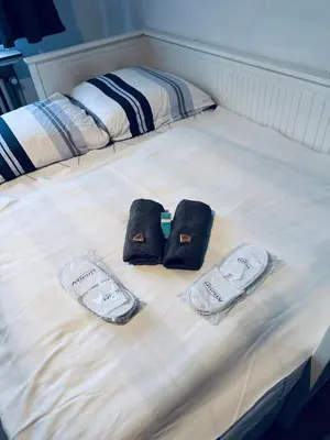 Ein Bett oder Betten in einem Zimmer der Unterkunft Whg 21 Ferienhaus mit Garten und Terrasse 130 qm