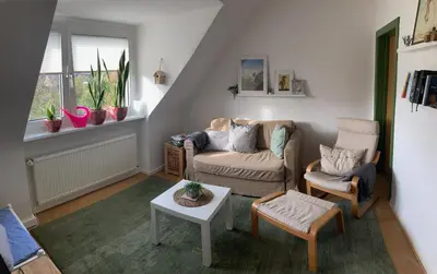 Ein Sitzbereich in der Unterkunft Ferienwohnung Amsel