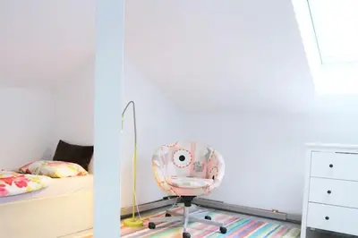 Ein Bett oder Betten in einem Zimmer der Unterkunft LIVING .... Bungalow mit großem Garten .