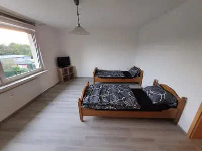 Ein Bett oder Betten in einem Zimmer der Unterkunft BK Meiderich