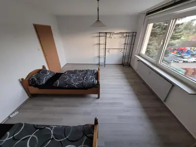 Ein Bett oder Betten in einem Zimmer der Unterkunft BK Meiderich