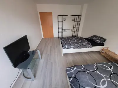 Ein Bett oder Betten in einem Zimmer der Unterkunft BK Meiderich