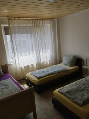 Ein Bett oder Betten in einem Zimmer der Unterkunft worker-flat