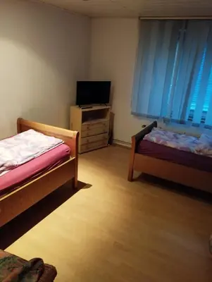 Ein Bett oder Betten in einem Zimmer der Unterkunft worker-flat
