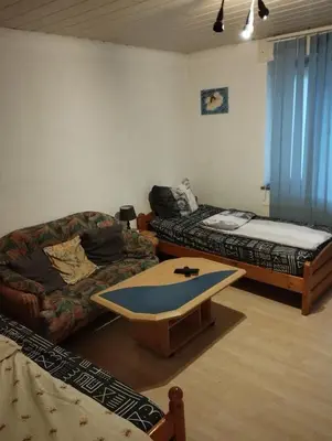 Ein Sitzbereich in der Unterkunft worker-flat