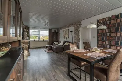 Ein Sitzbereich in der Unterkunft Schöne lichtdurchflutete Ferienwohnung mit Balkon