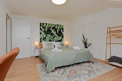 Ein Bett oder Betten in einem Zimmer der Unterkunft Stay&Dream - 75m² - Two Bedrooms - Kitchen - Netflix