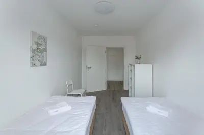 Ein Bett oder Betten in einem Zimmer der Unterkunft T&K Apartments-Comfortable 2 and 3 room apartments in Oberhausen