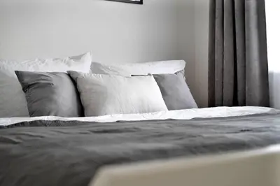 Ein Bett oder Betten in einem Zimmer der Unterkunft Apartments in the city center I home2share