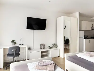 Ein Bett oder Betten in einem Zimmer der Unterkunft Apartments in the city center I home2share