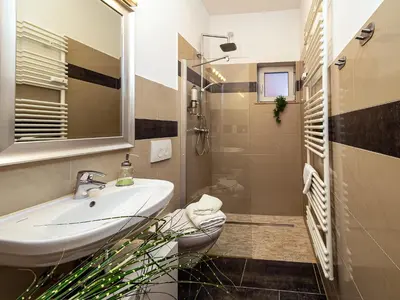 Ein Badezimmer in der Unterkunft Fabelhafte Apartments zum wohlfühlen mit JUNIK Apartments