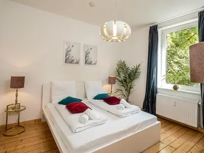 Ein Bett oder Betten in einem Zimmer der Unterkunft Fabelhafte Apartments zum wohlfühlen mit JUNIK Apartments
