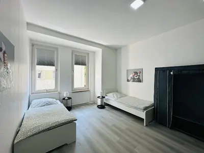 Ein Bett oder Betten in einem Zimmer der Unterkunft Monteur Appartement for max 6 Guests near Hagen-City