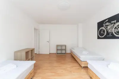 Ein Bett oder Betten in einem Zimmer der Unterkunft T&K Apartments - 3 Room Apartment
