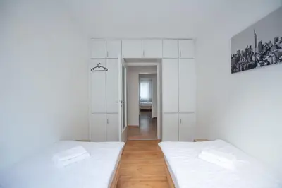 Ein Bett oder Betten in einem Zimmer der Unterkunft T&K Apartments - 3 Room Apartment