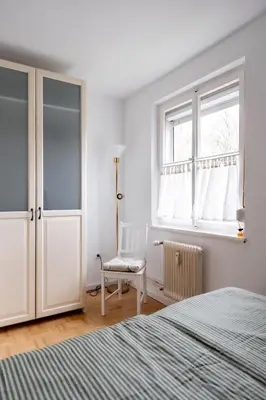 Ein Bett oder Betten in einem Zimmer der Unterkunft West48 Gemütliches Apartment -Blick auf Blauen See