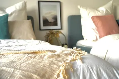Ein Bett oder Betten in einem Zimmer der Unterkunft Luxuriöses Altbau im Szenenviertel