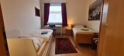 Ein Bett oder Betten in einem Zimmer der Unterkunft 3 Schlafzimmer &Wohnküche