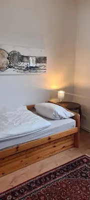 Ein Bett oder Betten in einem Zimmer der Unterkunft 3 Schlafzimmer &Wohnküche