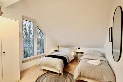 Ein Bett oder Betten in einem Zimmer der Unterkunft BEECH APARTMENT: MAISONETTE + FREE PARKING + NETFLIX