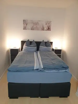 Ein Bett oder Betten in einem Zimmer der Unterkunft Apartment am Park 2