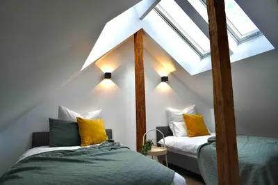 Ein Bett oder Betten in einem Zimmer der Unterkunft Luxuriöses Haus im Trendviertel