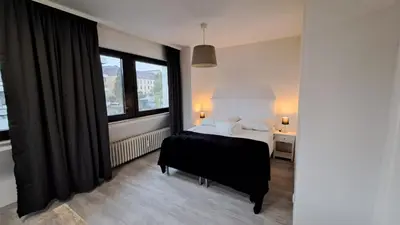 Ein Bett oder Betten in einem Zimmer der Unterkunft Wohnung am Krankenhaus, Ruhr, Wasserbhf.