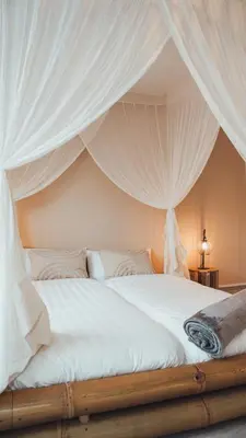 Ein Bett oder Betten in einem Zimmer der Unterkunft Love Cottage mit Whirlpool