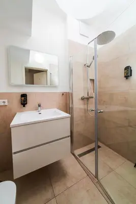 Ein Badezimmer in der Unterkunft City Rooms Dortmund