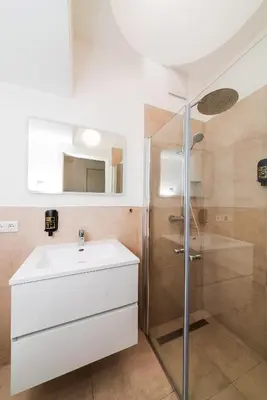 Ein Badezimmer in der Unterkunft City Rooms Dortmund