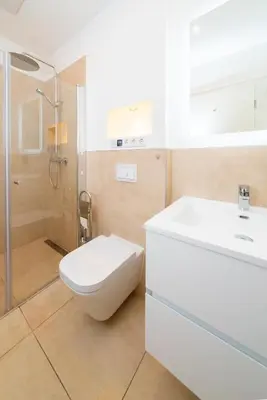 Ein Badezimmer in der Unterkunft City Rooms Dortmund
