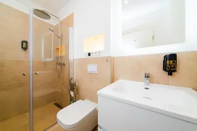 Ein Badezimmer in der Unterkunft City Rooms Dortmund