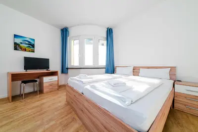 Ein Bett oder Betten in einem Zimmer der Unterkunft City Rooms Dortmund