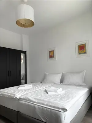 Ein Bett oder Betten in einem Zimmer der Unterkunft JayBnB - Modern eingerichtetes Apartment zentral in Dortmund