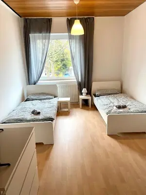 Ein Bett oder Betten in einem Zimmer der Unterkunft Core Rooms - Apartment Oberhausen