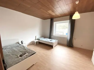 Ein Bett oder Betten in einem Zimmer der Unterkunft Core Rooms - Apartment Oberhausen