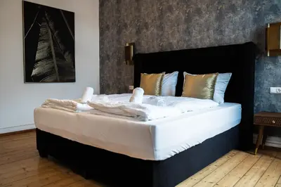 Ein Bett oder Betten in einem Zimmer der Unterkunft JUNIK Apartments - Deine Cityapartments in Duisburg