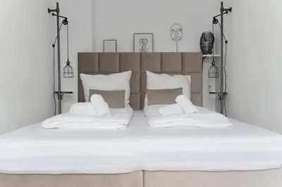 Ein Bett oder Betten in einem Zimmer der Unterkunft JUNIK Apartments - Deine Cityapartments in Duisburg