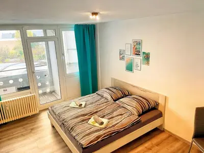 Ein Bett oder Betten in einem Zimmer der Unterkunft Apartment nähe Flughafen DUS