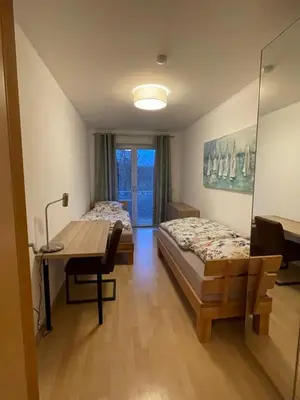 Ein Bett oder Betten in einem Zimmer der Unterkunft Helle Wohnung mit Balkon 120qm, 4Zimmer