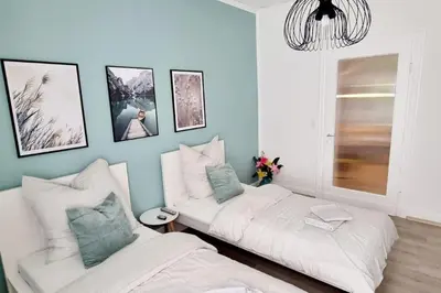 Ein Bett oder Betten in einem Zimmer der Unterkunft Your Cozy Appartment in Wuppertal: Wupper-Home 2
