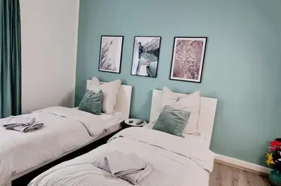 Ein Bett oder Betten in einem Zimmer der Unterkunft Your Cozy Appartment in Wuppertal: Wupper-Home 2