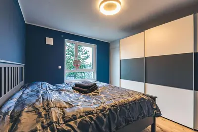 Ein Bett oder Betten in einem Zimmer der Unterkunft A&V Apartments Wunderschöne Penthouse Wohnung